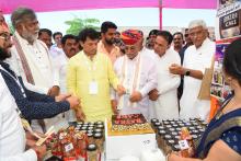 Interaction of the dignitaries with micro food processing enterprises at the food exhibition